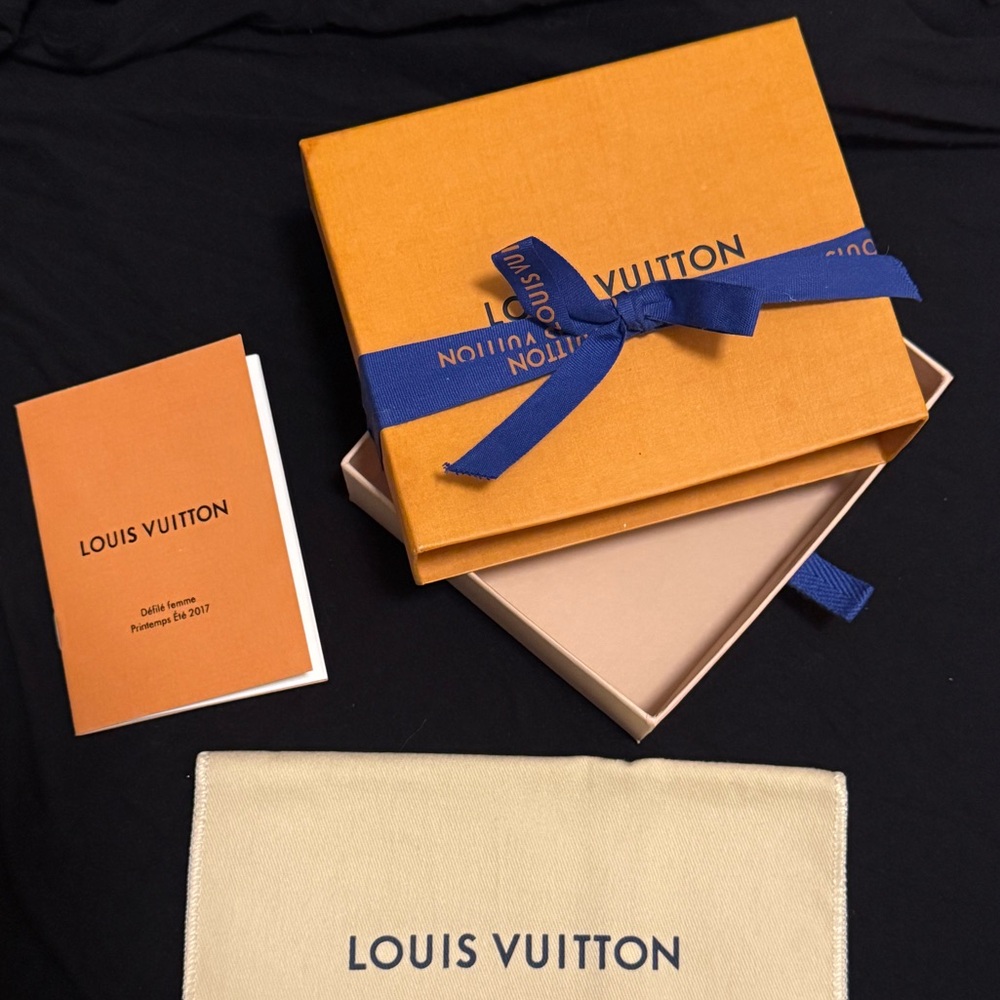Louis Vuitton orange wallet box with blue ribbon
